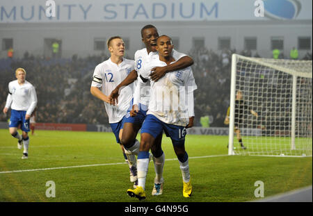 England's Rob Hall (right) is congratulated by England's Aziz Deen Conteh after scoring the opening goal during the U19 International Friendly at the AMEX Stadium, Brighton. Stock Photo