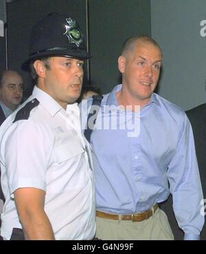 Rogue trader Nick Leeson, who brought down Barings Bank, makes his way to a news conference at London's Heathrow airport the day after Leeson was released from a Singapore jail. Stock Photo