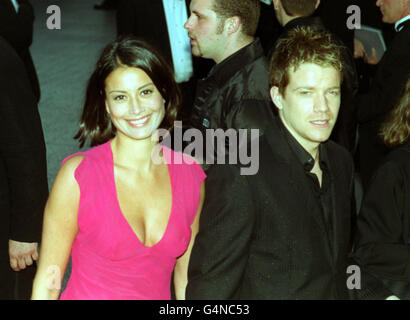 Big Breakfast presenter Melanie Sykes, and actor Max Beesley, arrive for the Royal Premiere of 'Star Wars Episode 1: The Phantom Menace' at the Odeon Leicester Square, London. Stock Photo