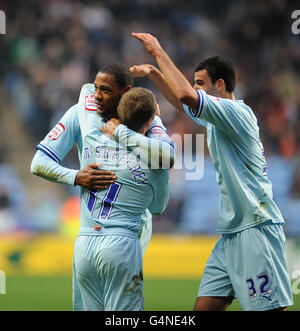 Soccer - npower Football League Championship - Coventry City v West Ham United - Ricoh Arena. Coventry City's Clive Platt celebrates with his team mates after scoring their first goal Stock Photo