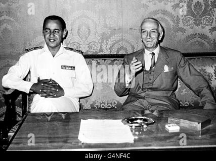 PA Photos 1/8/58 Crown Prince of Morocco (left), Moulay El Hassan being received by the Italian Defence Minister Antonio Segni. Stock Photo