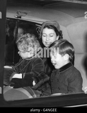 Queen Elizabeth II, Princess Anne and Prince Charles drive from King's Cross Station on their return from holiday at Sandringham. Stock Photo
