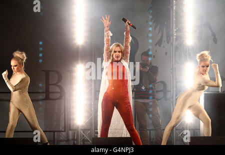 X Factor finalist Kitty Brucknell performs before switching on the Christmas lights at the Bluewater shopping centre in Greenhithe, Kent. Stock Photo