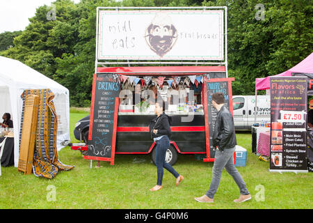 Food stall vans at the Afric Oye festival in Sefton Park, Liverpool, Merseyside, UK