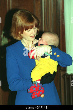 The Duchess of York cradles 5 month old Freddie Simon at St Thomas's Hospital, where she launched the 'Tommy's campaigne' to fund research into premature birth. Freddie spent the first 3 weeks of his life in an incubator in the hospital, was born six weeks early. Stock Photo