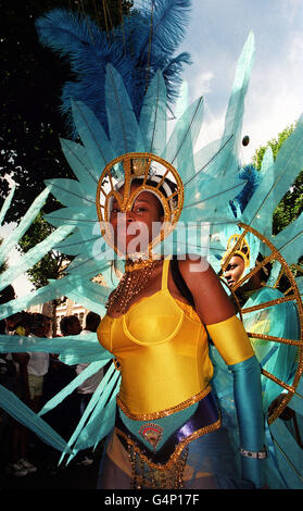 One of the costumes seen at the 35th Notting Hill Carnival in London, where more than 2 million people were expected to attend over the Bank Holiday weekend. * 15/08/2001: Organisers who fear a repeat of the violence which saw two people murdered at last year's event warn: Stay away if you are intent on causing trouble - or you will be arrested. The code gives advice to the two million revellers set to converge on west London for Europe's largest street party over the Bank Holiday weekend. They are urged to tell police if they see any trouble. Carnival goers are also advised to come and leave Stock Photo