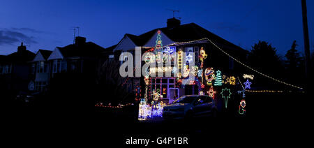 A semi-detached house on Longford Road, Melksham, Wiltshire, shines bright as it is lit up by Christmas lights and decorations as some households in the UK enter into the festive spirit. Stock Photo