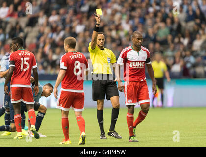 Vancouver, Canada. 18 June, 2016. New England Revolution defender Jose Goncalves (23) getting a yellow card. Vancouver Whitecaps vs New England Revolution, BC Place Stadium.  Final Score New England wins 2-1. Credit:  Gerry Rousseau/Alamy Live News Stock Photo