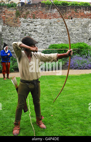 Greenwich, London, UK. 18th June, 2016. Re-enactors dressed as medieval bowmen during a re-enactment in Greenwich, London, UK. The 'Grand Medieval Joust' was held at Eltham Palace, an English Heritage property which was the home of King Henry VIII as a child. The event aims to give an insight into life at the palace during the medieval period. Credit:  Michael Preston/Alamy Live News Stock Photo