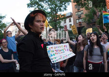 New York, USA. 18th June 2016. Demonstrators rally in front of Stonewall Inn. Members and supporters of the LGBT community rallied at Stonewall Inn in Greenwich Village in solidarity with Orlando after a march from Grand Central Terminal. Credit:  M. Stan Reaves/Alamy Live News Stock Photo