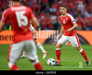 Lille, France. 19th June, 2016. Granit Xhaka of Switzerland controls during the preliminary round match between Switzerland and France at Pierre Mauroy stadium in Lille, France, 19 June, 2016. Photo: Marius Becker/dpa/Alamy Live News Stock Photo