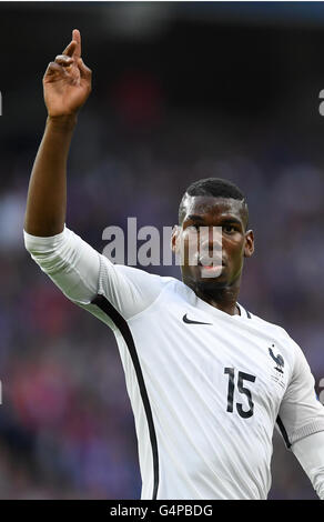 Lille, France. 19th June, 2016. Paul Pogba of France reacts during the preliminary round match between Switzerland and France at Pierre Mauroy stadium in Lille, France, 19 June, 2016. Photo: Marius Becker/dpa/Alamy Live News Stock Photo