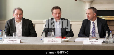 (Left to right) Ronan Rooney and John Hearne from Curam Sofware and Craig Hayman, General Manager of IBM Industry Solutions, announce the acquisition of Curam Software by IBM at a press conference at the Merrion Hotel in Dublin. Stock Photo