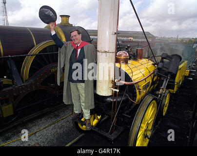 Michael Bailey on a replica of Stephenson's Rocket Locomotive at the National railway Museum in York. The Worlds first Doctorate in Railway studies has been awarded to early locomotive consultant Michael Bailey. Stock Photo