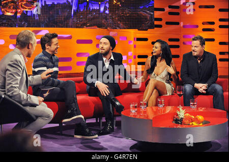 Presenter Graham Norton (left) with guests, (left to right) Robert Downey Jr, Jude Law, Alesha Dixon and Eddie Izzard, during filming of The Graham Norton Show, at The London Studios, south London, to be aired on BBC One on Friday evening. Stock Photo