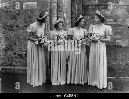 The bridesmaids at the wedding of Honourable Patricia Mountbatten and Lord Brabourne. (L-R) The Hon. Pamela Mountbatten, sister of the bride, Princess Alexandra of Kent, Princess Elizabeth and Princess Margaret at Romsey Abbey. Stock Photo