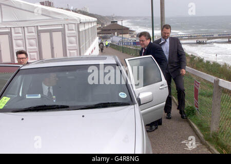 Deputy Prime Minister John Prescott leaves Bournemouth International Centre to drive the 300 yards to his hotel, after his address to the Labour conference. A Labour Party spokesman said Mr Prescott and PM Tony Blair travel by car for security reasons on police advice. Stock Photo