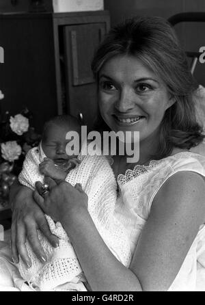 Actress Hannah Gordon at Queen Charlotte's Maternity Hospital in London with her baby son . The baby, Miss Gordons first child, was born on 19th July weighing 7lb 5oz. Miss Gordon, 28, lives with her film cameraman husband Norman Warwick in Middlesex. Stock Photo