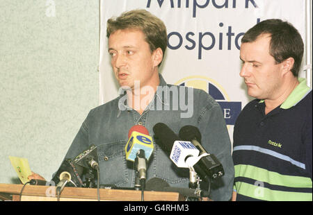 Mr John Sparrowe (left) and his brother-in-law Simon Booth during a press conference at Milpark Hospital which is located near Lydenburg where his father Tony died and his mother Jane was badly injured in the South African coach disaster that killed 27 people. * John holds a handmade get-well card from nursery school pupils at the Klopie Klopie (Knock Knock) nursery school in Long Tom Pass. Stock Photo