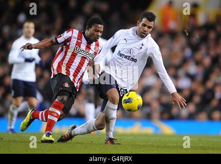 Sunderland's Stephane Sessegnon (left) and Tottenham Hotspur's Raniere Sandro battle for the ball Stock Photo