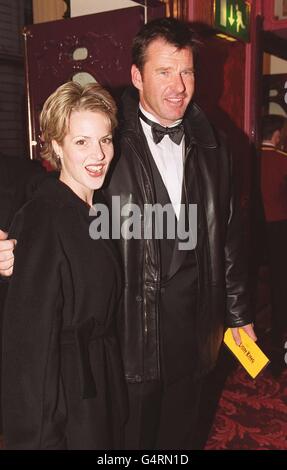 British golfer Nick Faldo arrives with Valerie Bercher at the British premiere of Walt Disney's spectacular musical The Lion King at the West End Lyceum Theatre in London with partner Valerie Bercher. Stock Photo