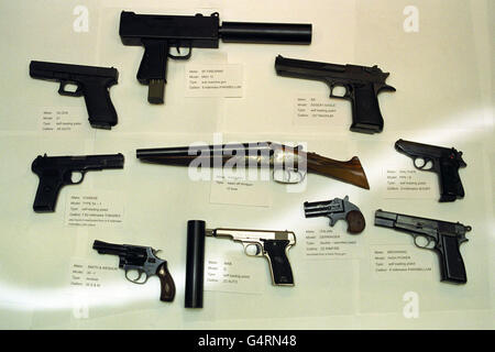 This is the terrifying haul of guns used by gangsters in some of the 21 Yardie-style murders, on display at New Scotland Yard. The cache includes a MAC-10 machine pistol, known as Big Macs in the underworld and capable of firing 10 rounds a sec. Also on display were sawn-off shotguns and pistols . Stock Photo