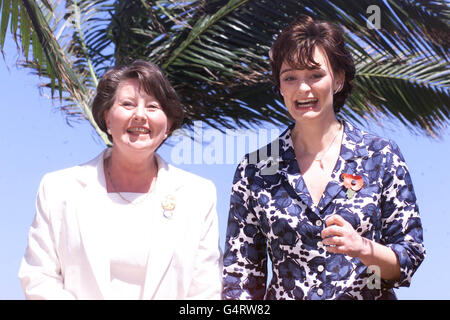 Cherie Blair (R), wife of British Prime Minister Tony Blair, and the wife of the Australian Prime Minister, Janette Howard, at Zimbali Lodge in Durban, South Africa, where they took lunch, while their husbands attended the first day of CHOGM. * Commonwealth Heads of Government Meeting. Stock Photo