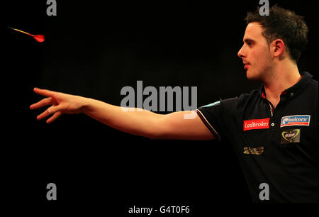 Terry Jenkins in action against Joe Cullen during the Ladbrokes.com ...