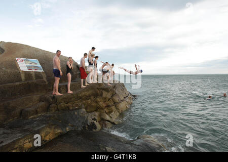 STANDALONE Photo. Hundreds of people at the annual Forty Foot Christmas Day Swim at Sandycove, Dublin. Stock Photo