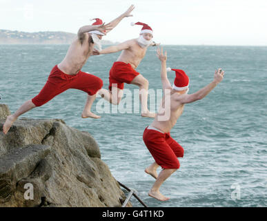 STANDALONE Photo. Hundreds of people at the annual Forty Foot Christmas Day Swim at Sandycove, Dublin. Stock Photo