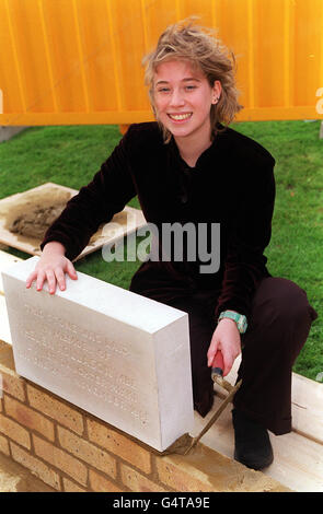 Nikki Rollason,16, lays the foundation stone for a cancer centre, at the North Middlesex Hospital in north London, to be named after her mother, BBC presenter Helen Rollason, who died of cancer in August 1999 aged 43. * Helen, of Shenfield, near Brentwood, Essex, died of cancer in August 1999, two years after being given just three months to live. She set up the appeal for the cancer centre at the North Middlesex Hospital, but did not live to see the start of building work. Stock Photo