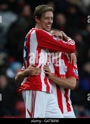 Stoke City's Peter Crouch celebrates scoring his sides second goal of the game with team-mate Jonathan Walters during the Barclays Premier League match at Ewood Park, Blackburn. Stock Photo