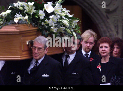 Blind Date presenter Cilla Black (R) leaves the St. Mary the Virgin Church in Denham, Buckinghamshire, with her son Ben (2nd R) following the funeral of her husband Bobby Willis, who died 27/10/99 after a battle with liver and lung cancer, aged 57. Stock Photo