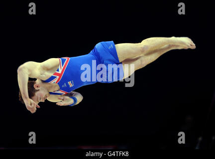 Great Britain's Daniel Purvis goes on to win Gold on the Floor during the Men's Individual final during the Visa International Gymnastics at the North Greenwich Arena, London. Stock Photo