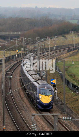 A general view of a Hitachi Class 395 Javelin train as it passes through Ashford, Kent, using the HS1 Channel Tunnel Rail Link as a controversial new high-speed rail line between London and Birmingham has been given the go-ahead by government. Stock Photo