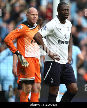 Soccer - Barclays Premier League - Manchester City v Tottenham Hotspur - Etihad Stadium. Tottenham Hotspur's Ledley King and goalkeeper Brad Friedel stand dejected after conceding the second goal Stock Photo