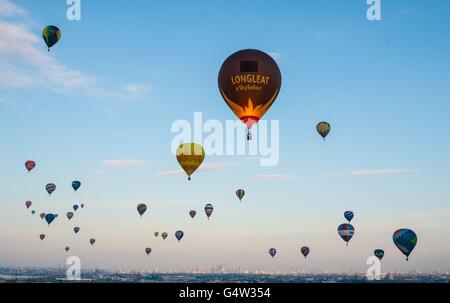 Hot air balloons fly over London during the Lord Mayor's Hot Air Balloon Regatta, which sees over 40 hot air balloons flying over central London to raise funds for the Lord Mayor's Appeal. Stock Photo