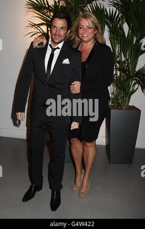 Peter Andre and publicist Claire Powell arriving for the 2012 NTA Awards at the O2, Greenwich, London Stock Photo