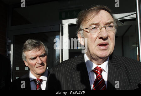 Former junior minister Ivor Callely (left) is released from custody in Irishtown Garda station,Dublin accompanied by his solicitor Noel O'Hanrahan (right). Stock Photo