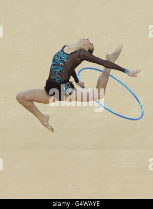 Ukraine's Ganna Rizatdinova goes on to win Silver during the Individual All Round Final of the Visa International Gymnastics at the North Greenwich Arena, London. Stock Photo