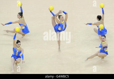 Gymnastics - Visa International Gymnastics - Day Nine - North Greenwich Arena. Great Britain perform during the Group All Round Final during the Visa International Gymnastics at the North Greenwich Arena, London. Stock Photo