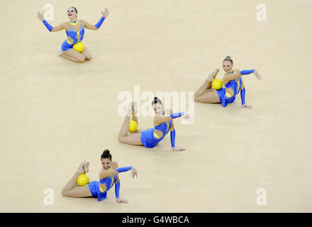 Great Britain perform during the Group All Round Final during the Visa International Gymnastics at the North Greenwich Arena, London. Stock Photo