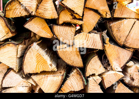 Stacked firewood, logs for burning in the stove or fireplace,