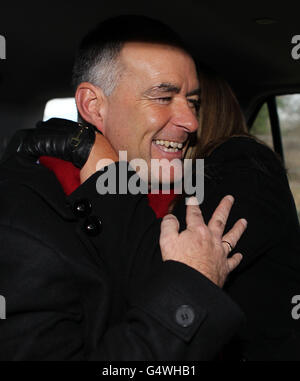 Former MSP Tommy Sheridan is hugged by his wife Gail, as he leaves Castle Huntly Prison,near Dundee, after serving just over one year of his three-year sentence for lying under oath. Stock Photo