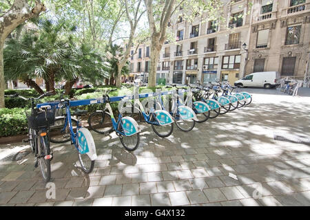 Free public rental bikes parked in a rack in Palma de Mallorca, Balearic islands, Spain on April 13, 2016. Stock Photo