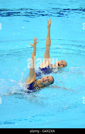 Malaysia's Png Hui Chuen and Katrina Ann Abdul Hadi in action in the Duets Technical Routine Stock Photo