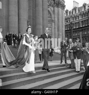 Queen Elizabeth II and the Duke of Edinburgh leaving St. Paul's Cathedral after the 150th Anniversary of the Order of St. Michael and St. George. Stock Photo