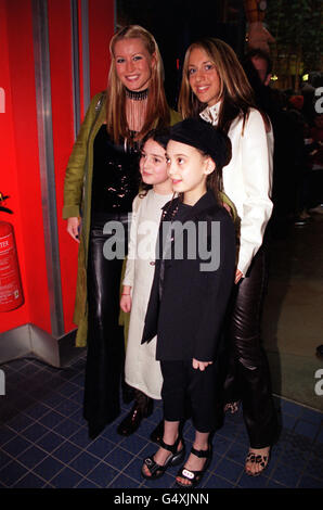 TV presenter Denise Van Outen (left) arrives for the British film premiere of Toy Story 2 at the Warner Village Cinema in Finchley, London. Stock Photo