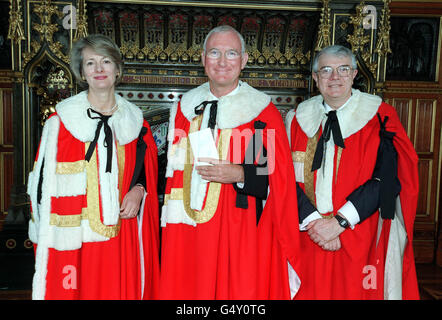 Former BBC Director General Sir John Birt (C) takes his seat on the Lords benches. Lord Birt was sponsored by Lords Leader Baroness Jay of Paddington (L) and Lord Burns. Stock Photo