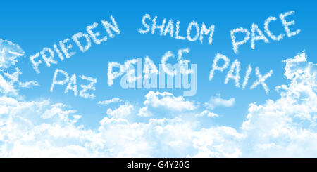 multilingual peace message written with cloud fonts on blue heaven background, Stock Photo